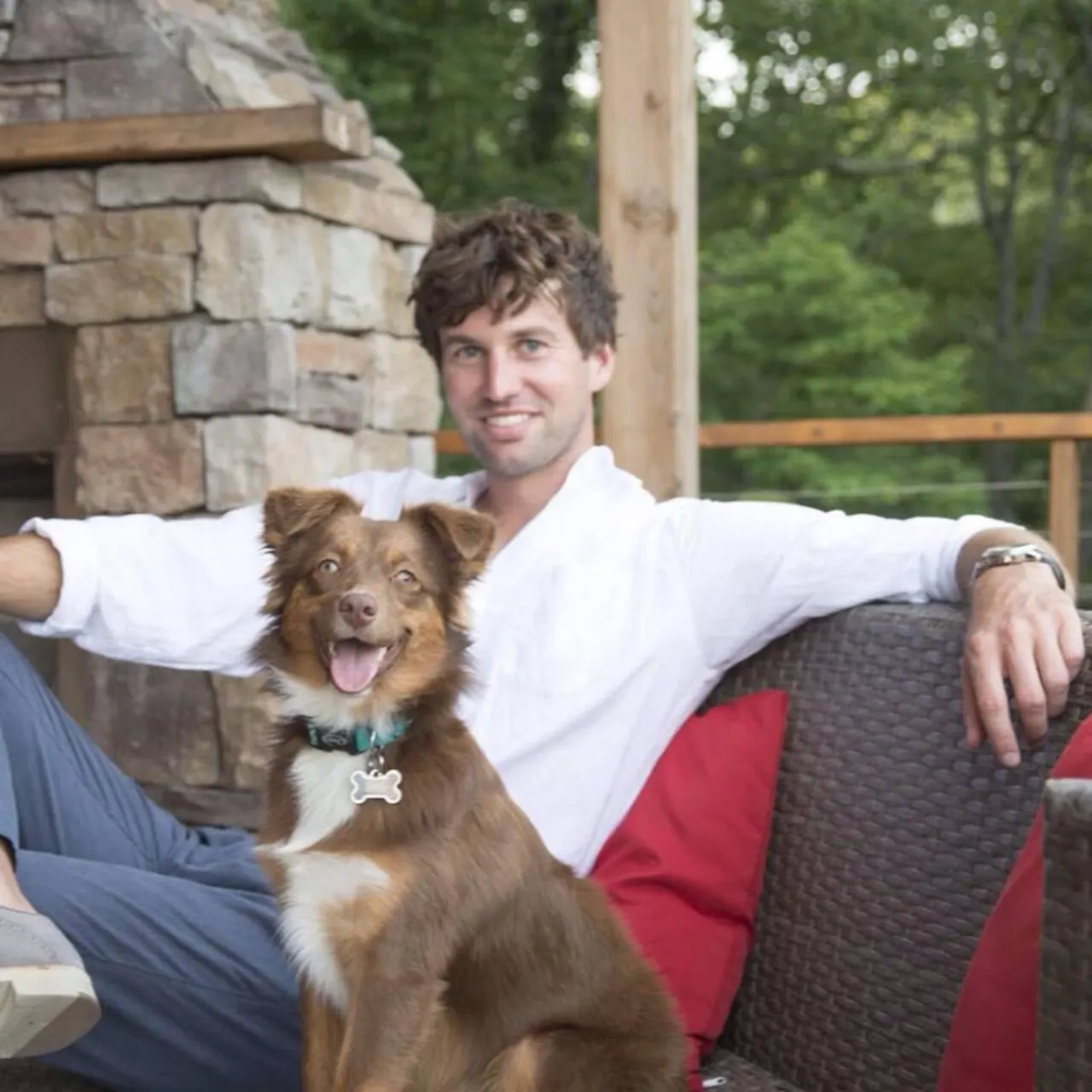 Sam at home with his dog